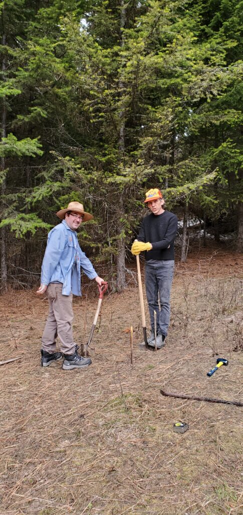 Shane and Jerry dig a hole