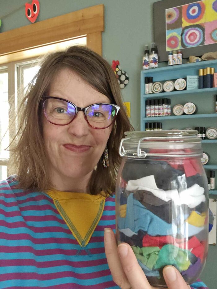 Upcycled Wipes held by Erika