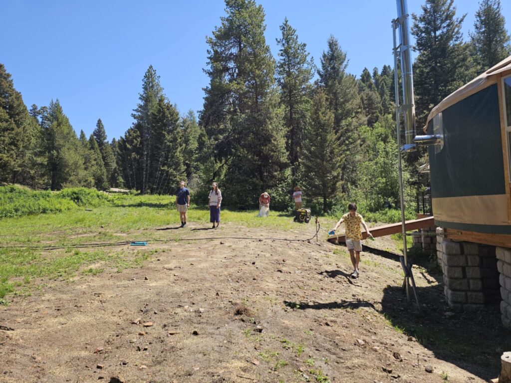 Spreading Grass Seed and a Sprinkler