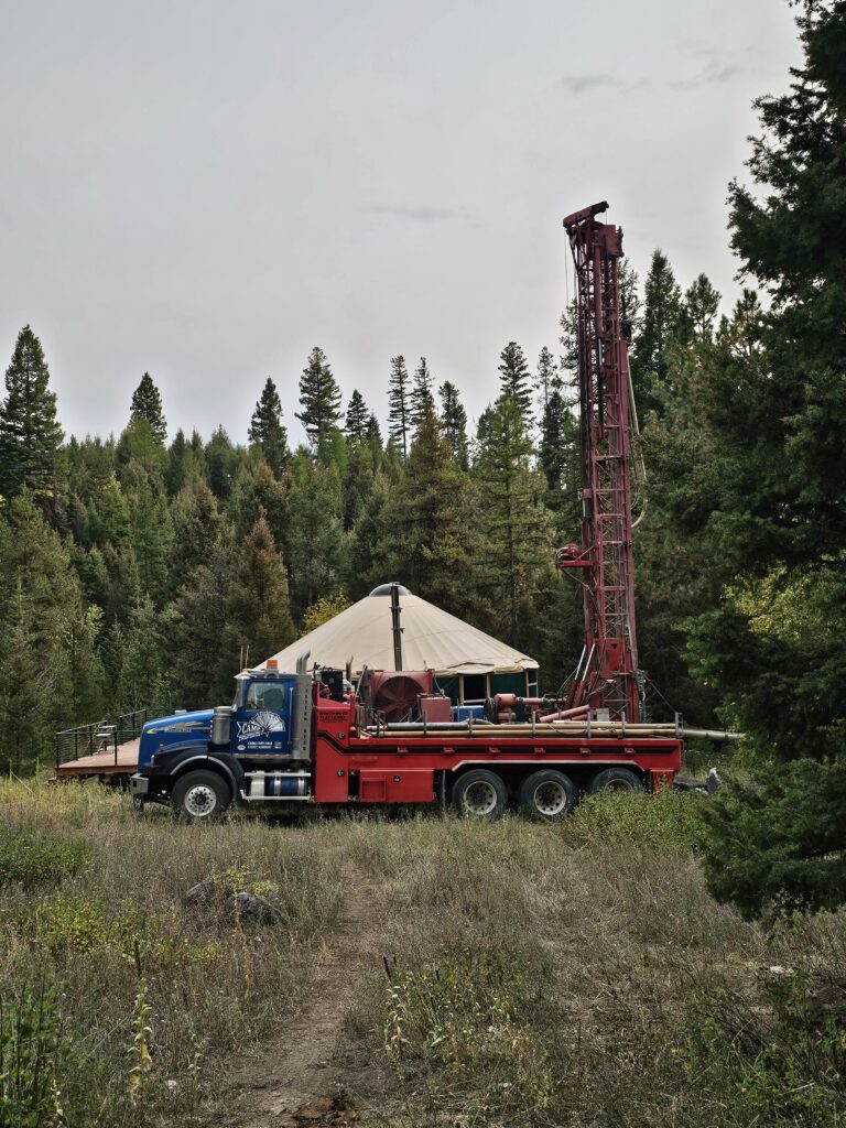 2 well drilling trucks and yurt
