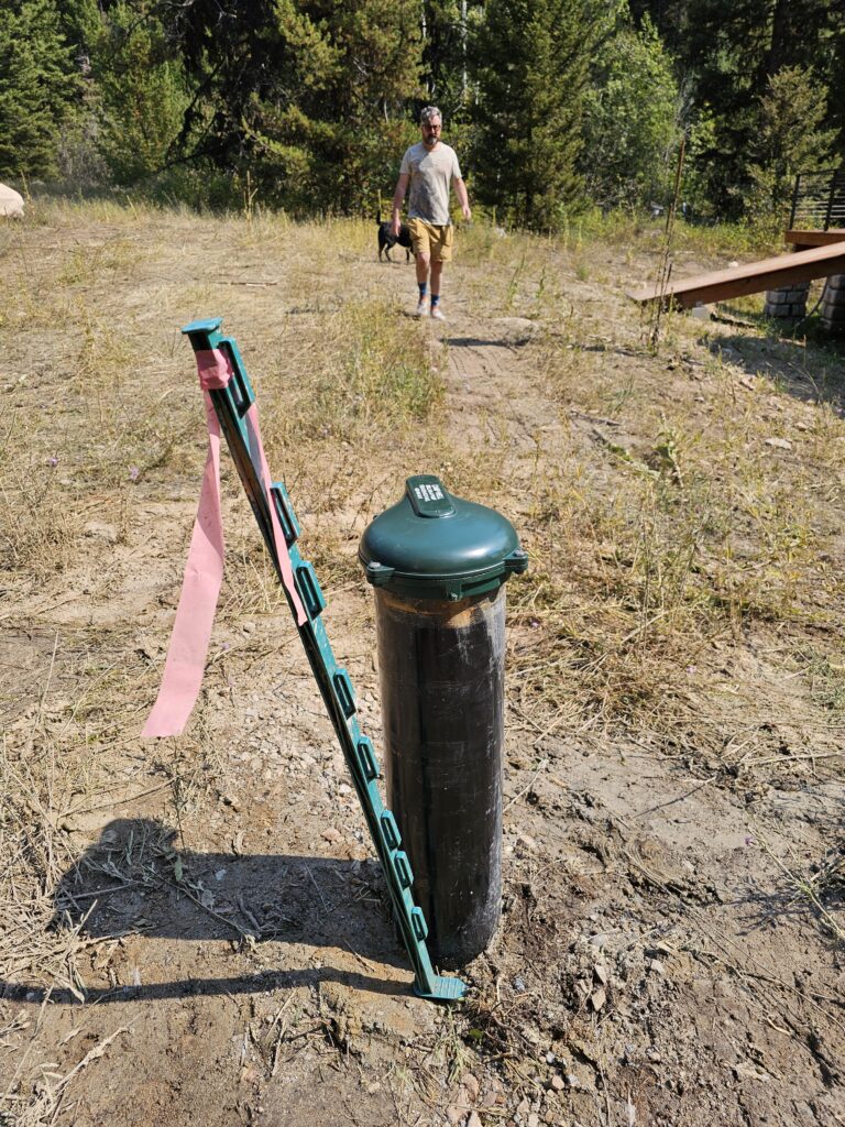 Well Cap and Person Walking