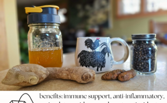 ginger root, turmeric and black pepper and a tea cup